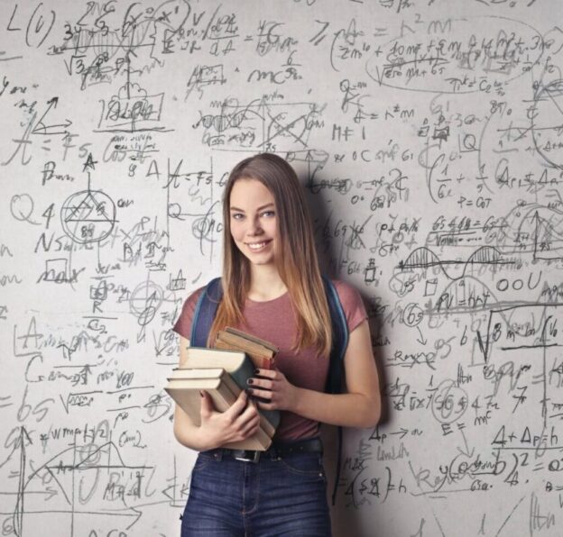 woman holding books